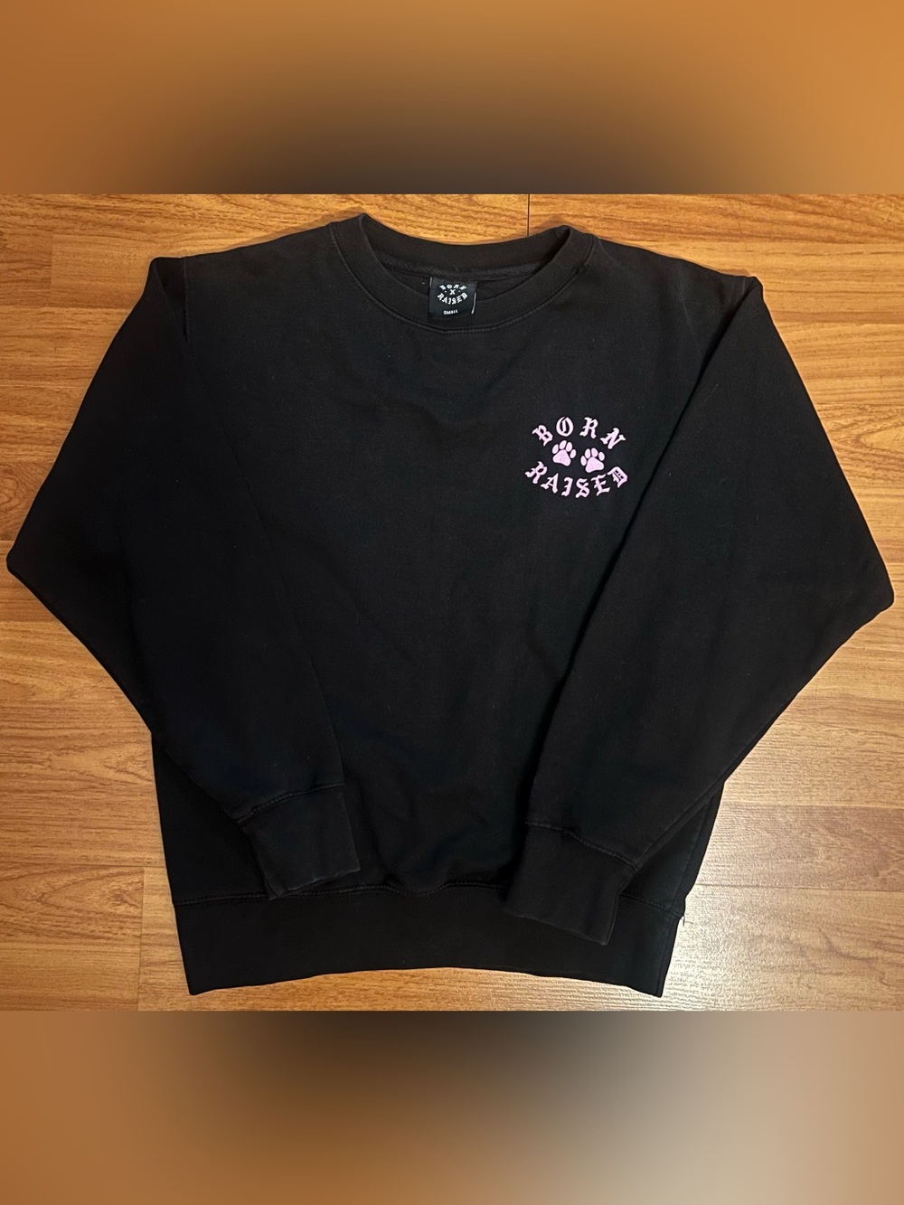 BORN X RAISED Black Crewneck with Pink Chest Logo